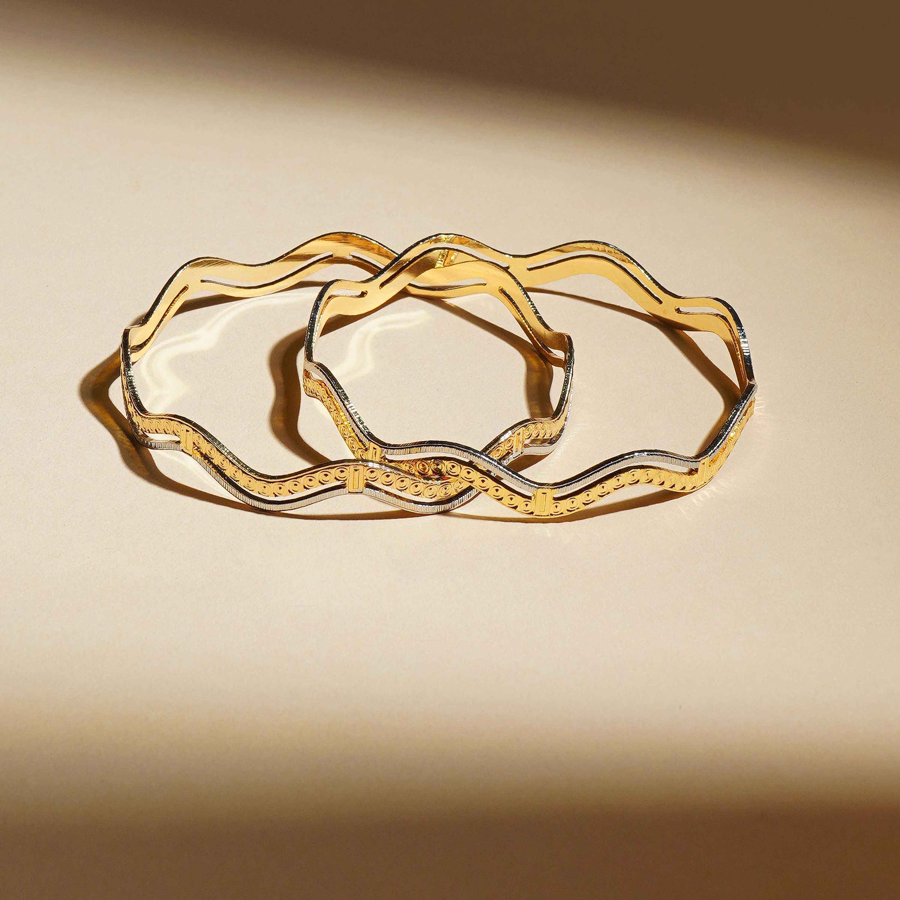 Aaravi Gold Plated Bangles ( Set of 2 )