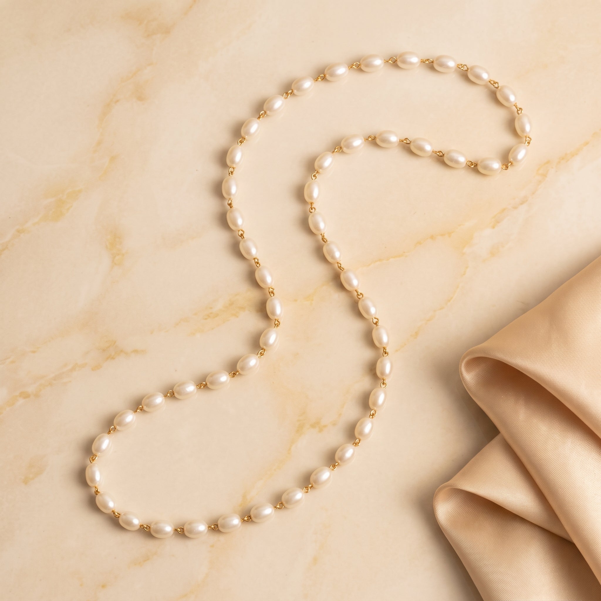 Muktaa Oval Pearl Mala