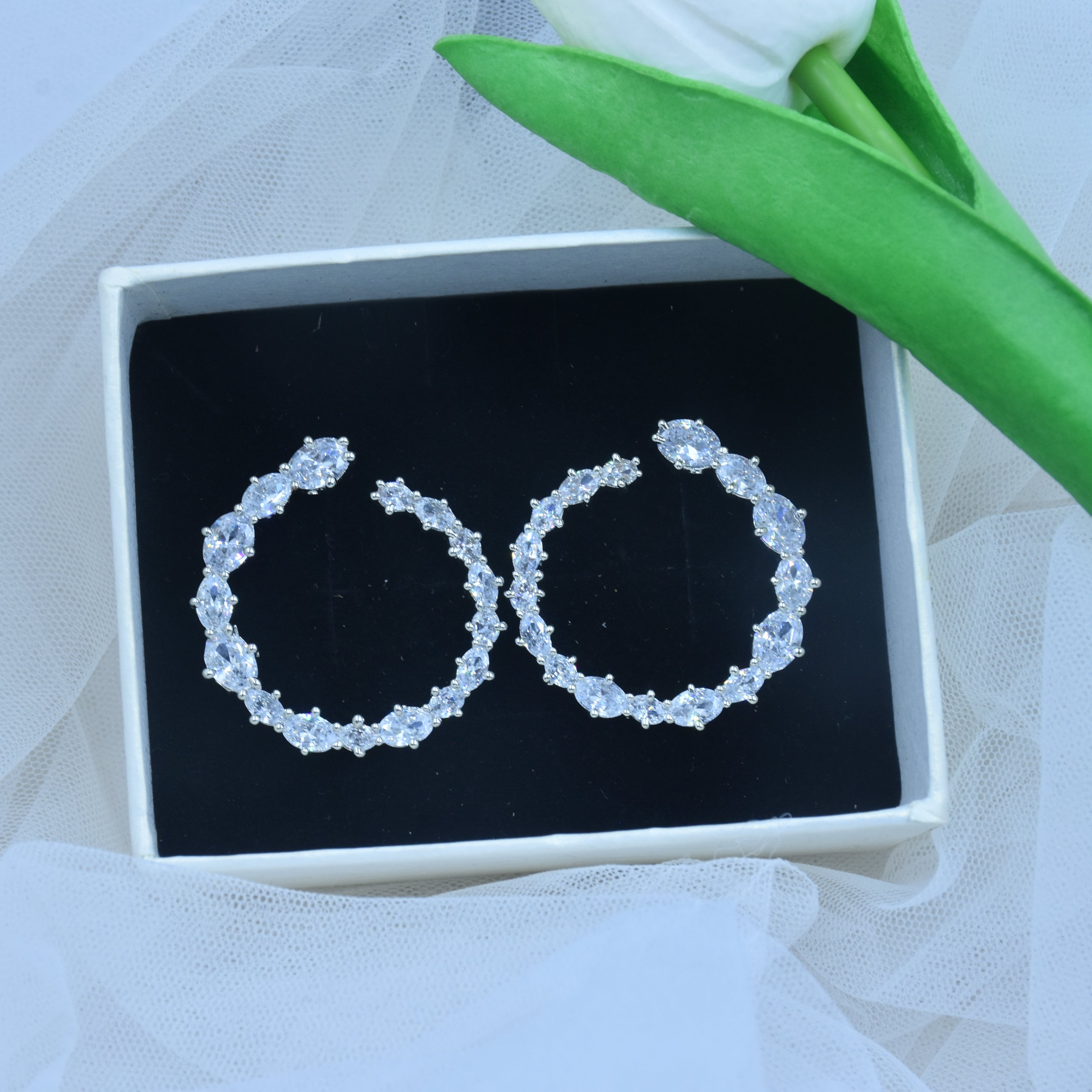 Anvitha CZ Diamond cut Stud Earrings