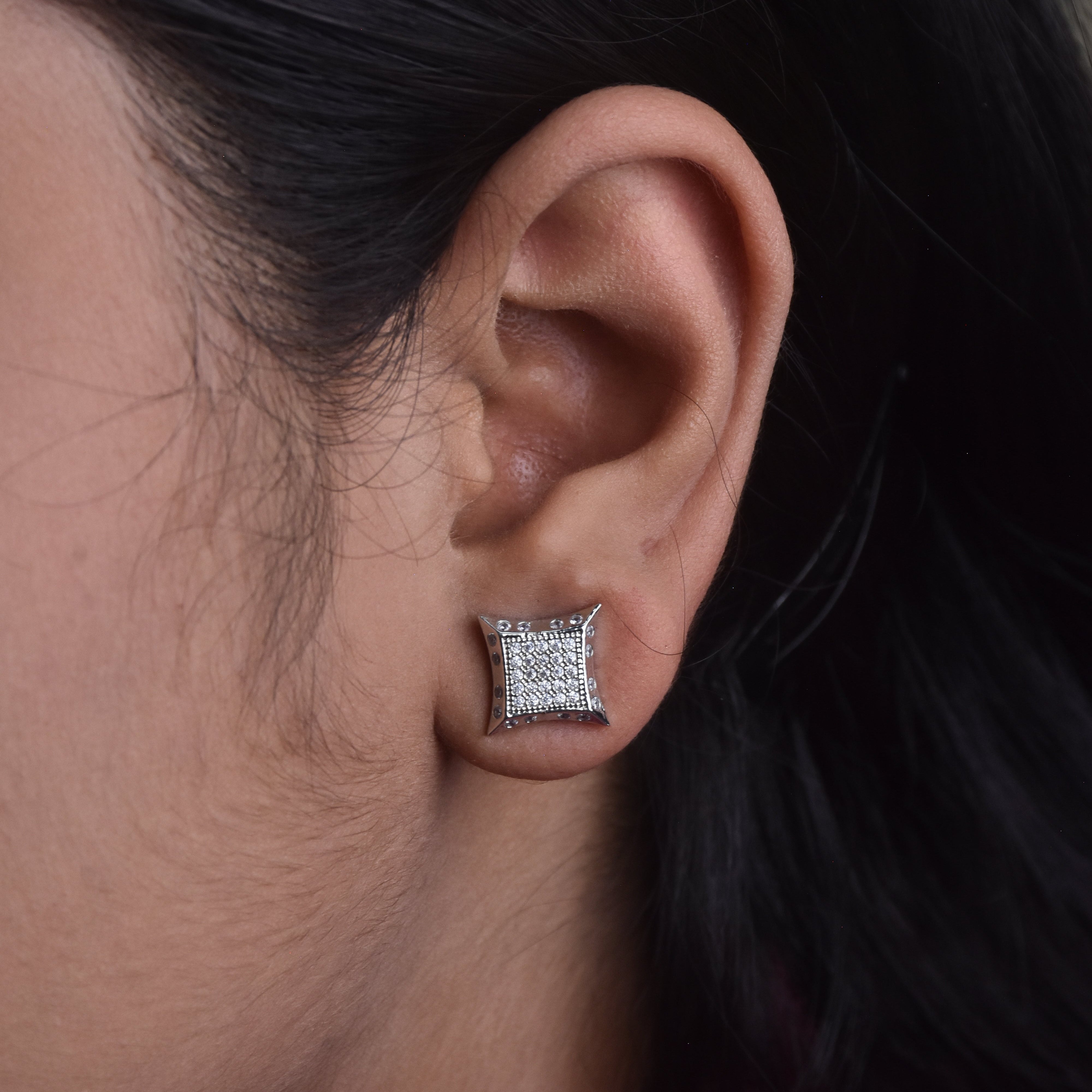 Honey Singh cubic zirconia stud earrings close up