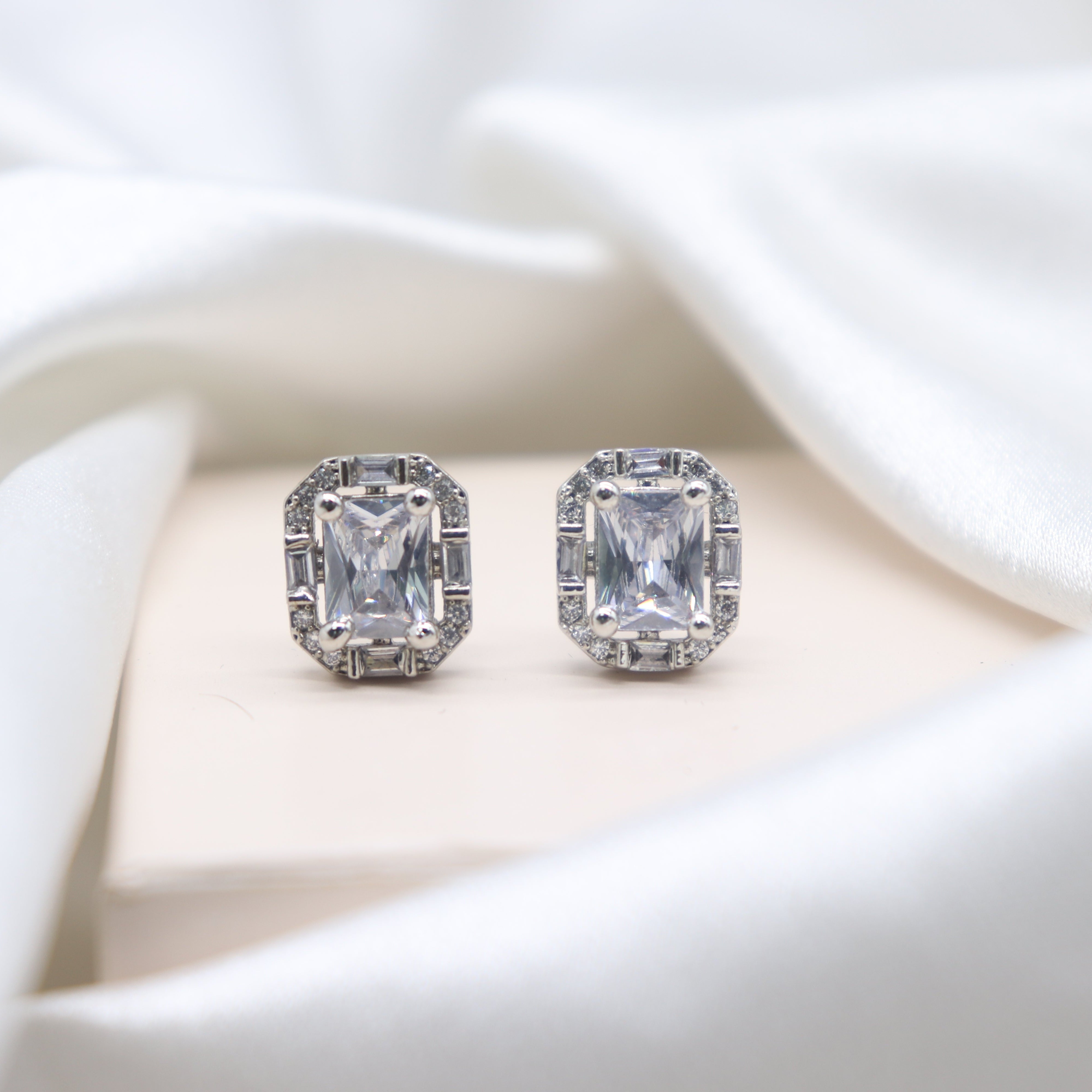 Urvashi CZ Diamond cut Stud Earrings