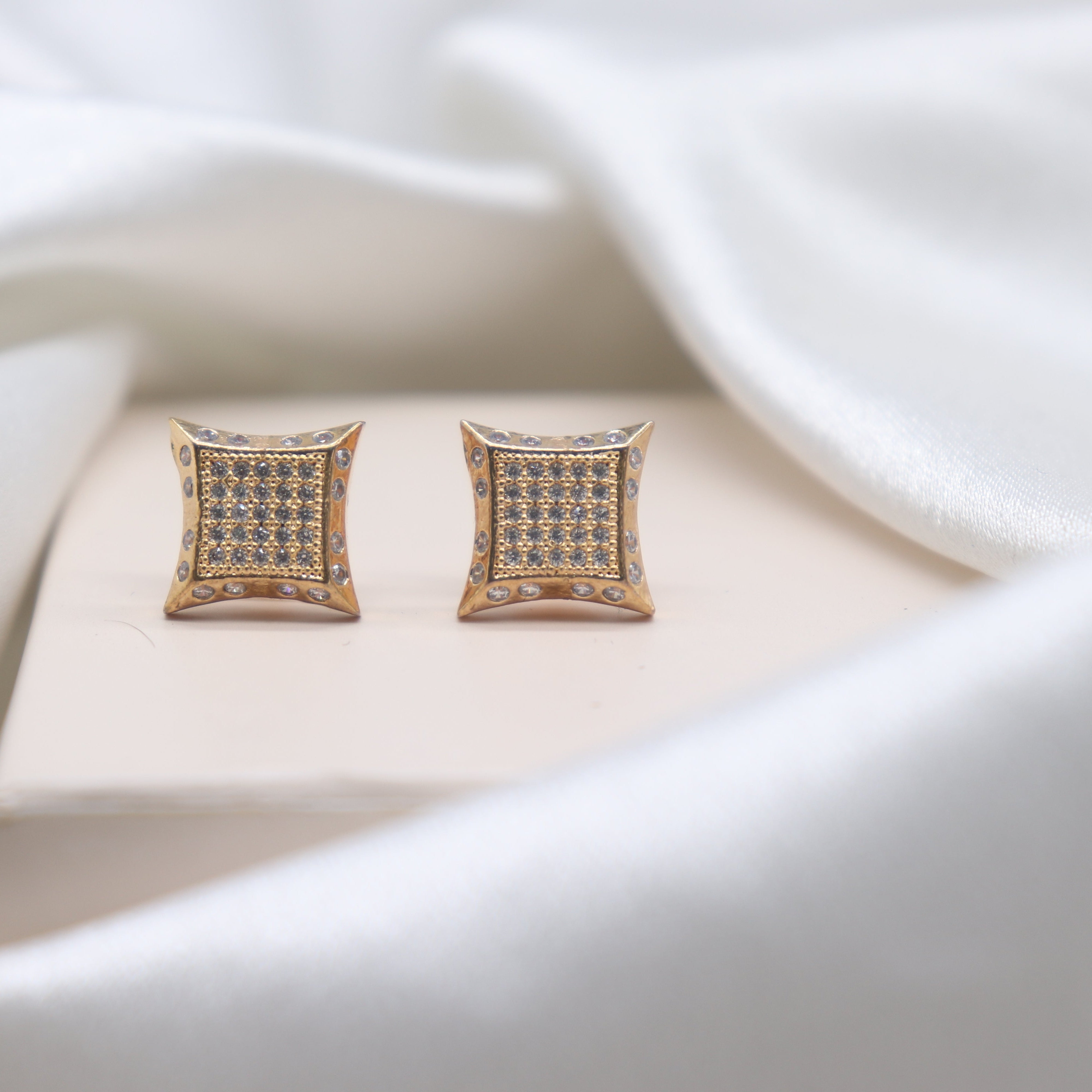 Yo Yo Honey Singh cubic zirconia stud earrings close up