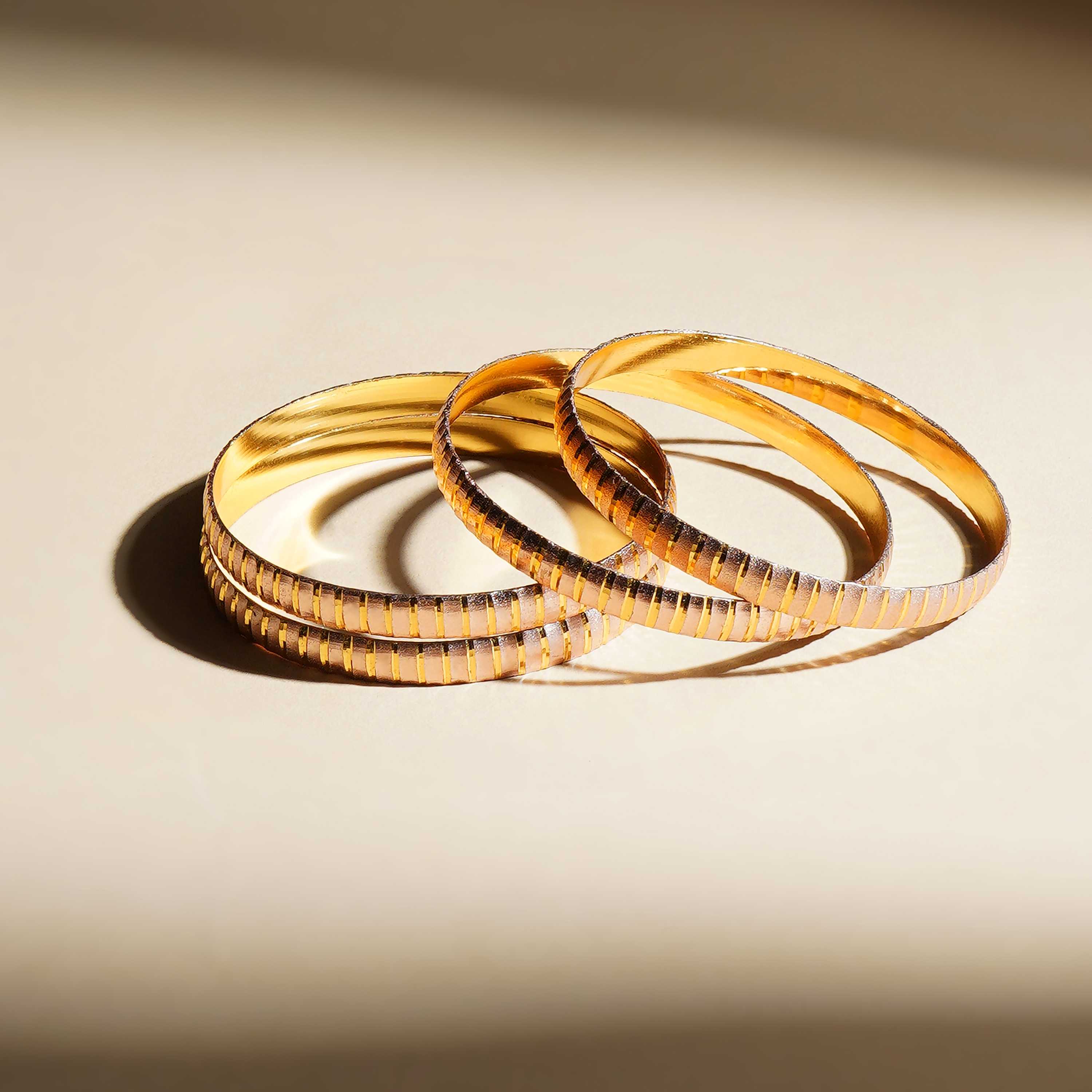 Pranvika Gold Plated Bangles ( Set of 4 )