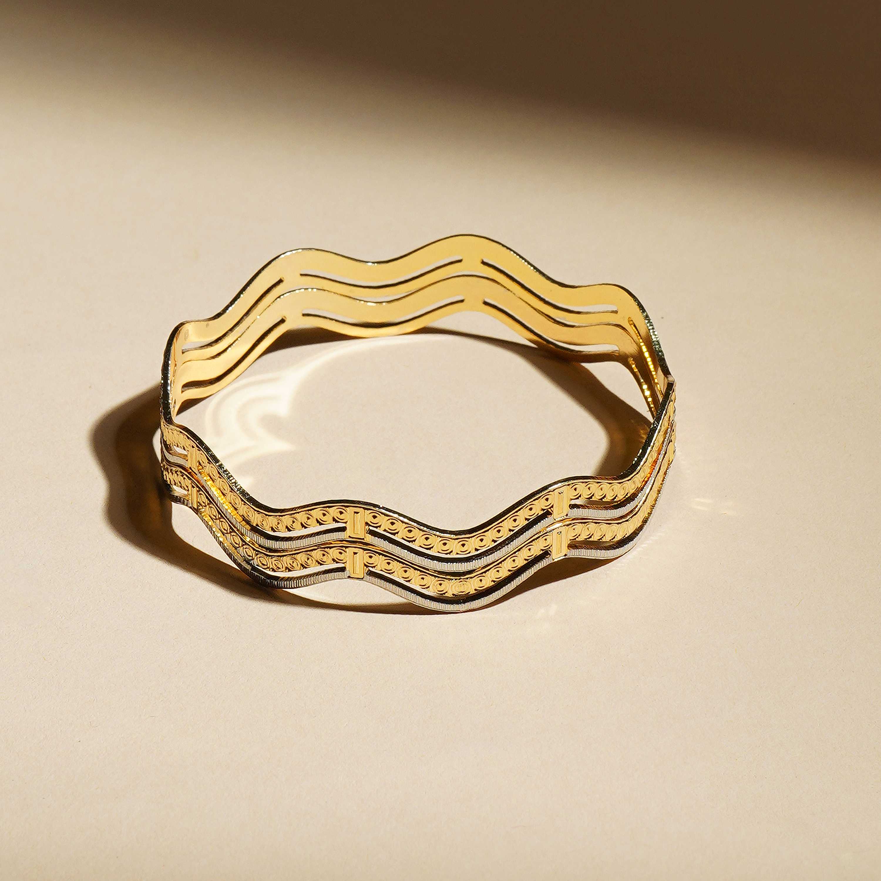 Aaravi Gold Plated Bangles ( Set of 2 )