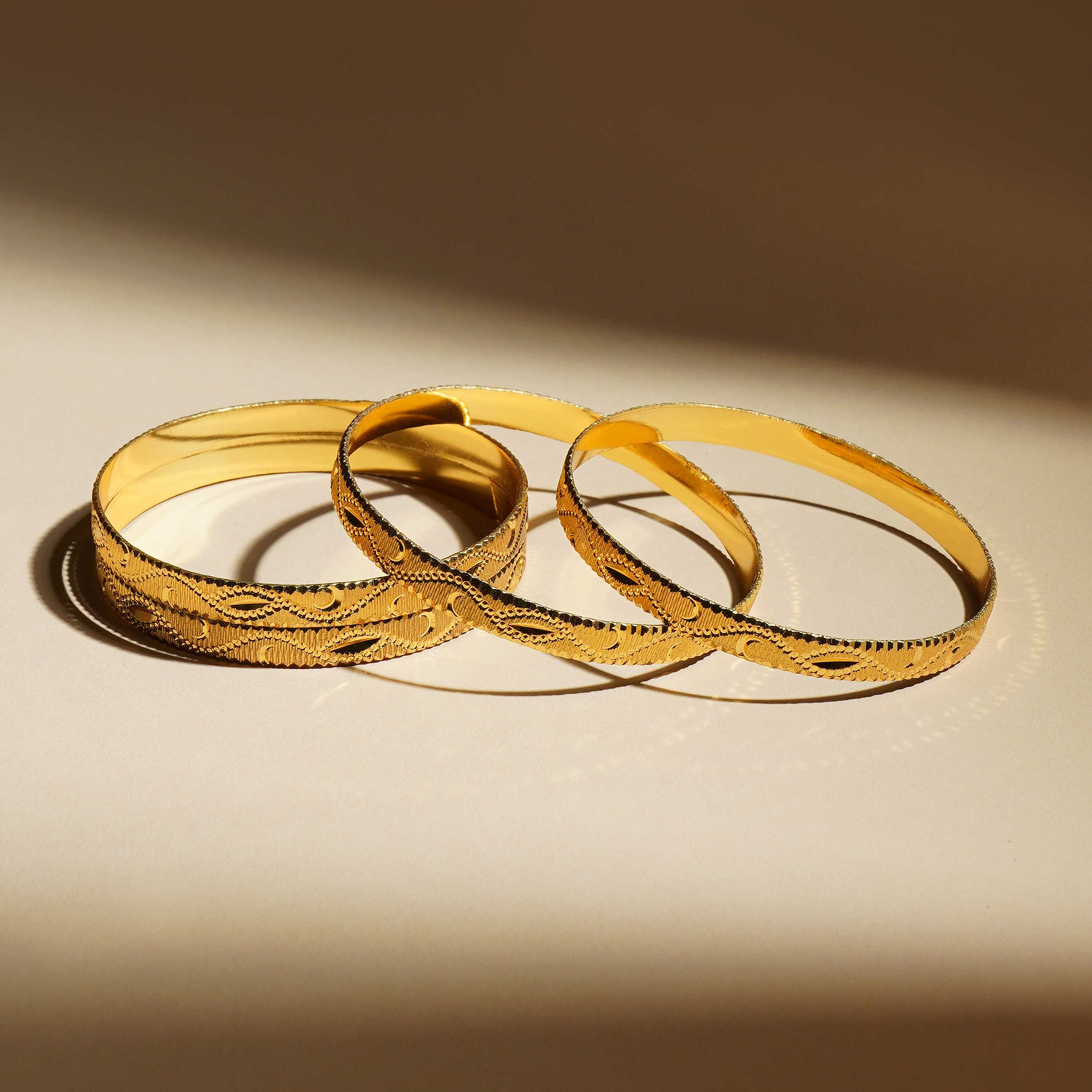 Lavya Gold Plated Bangles ( Set of 4 )