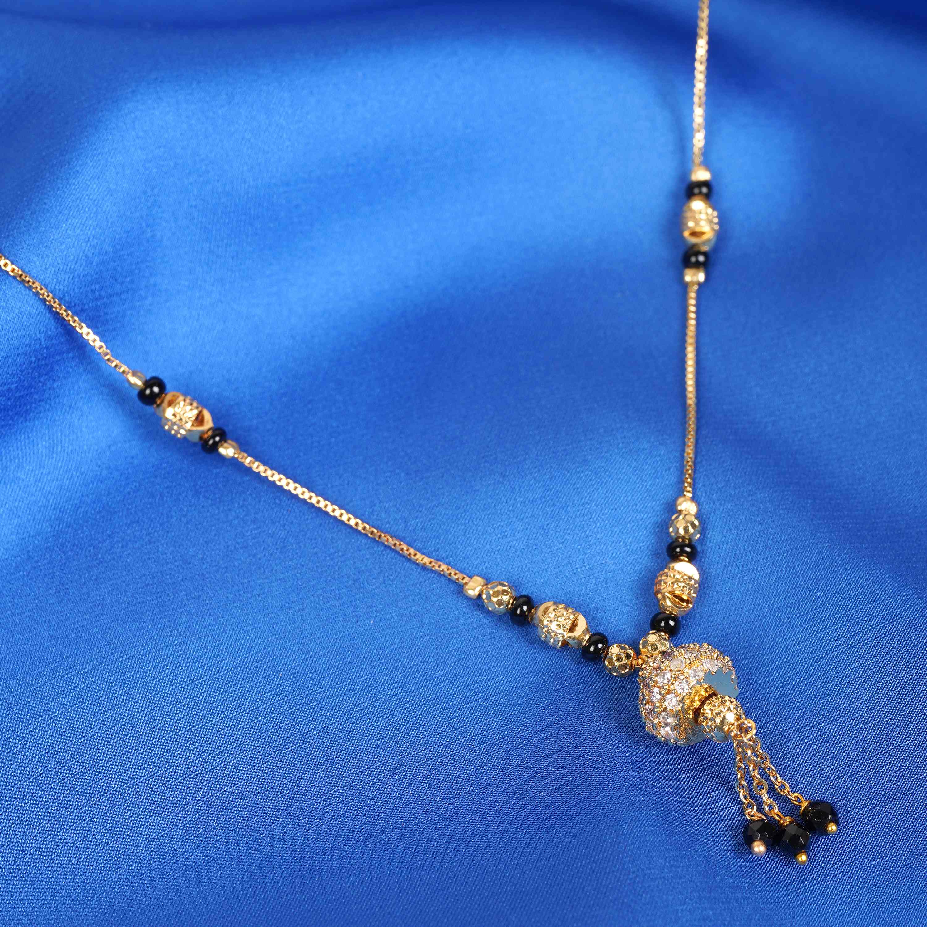 Snehal gold plated mangalsutra Close up image 
